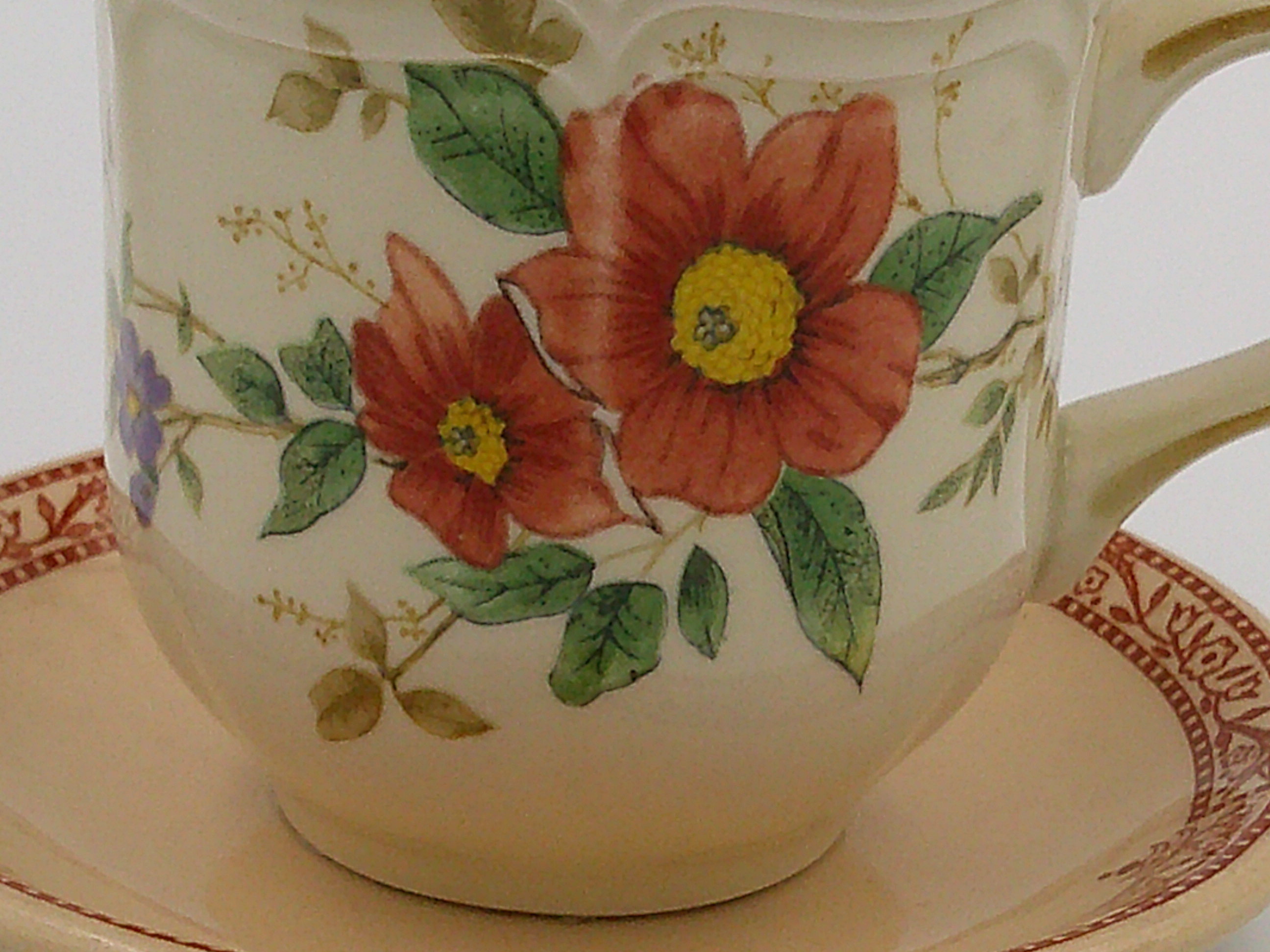 This shows the front details of the flowers as well as the details of the saucer., This shows the front details of the flowers as well as the details of the saucer.,